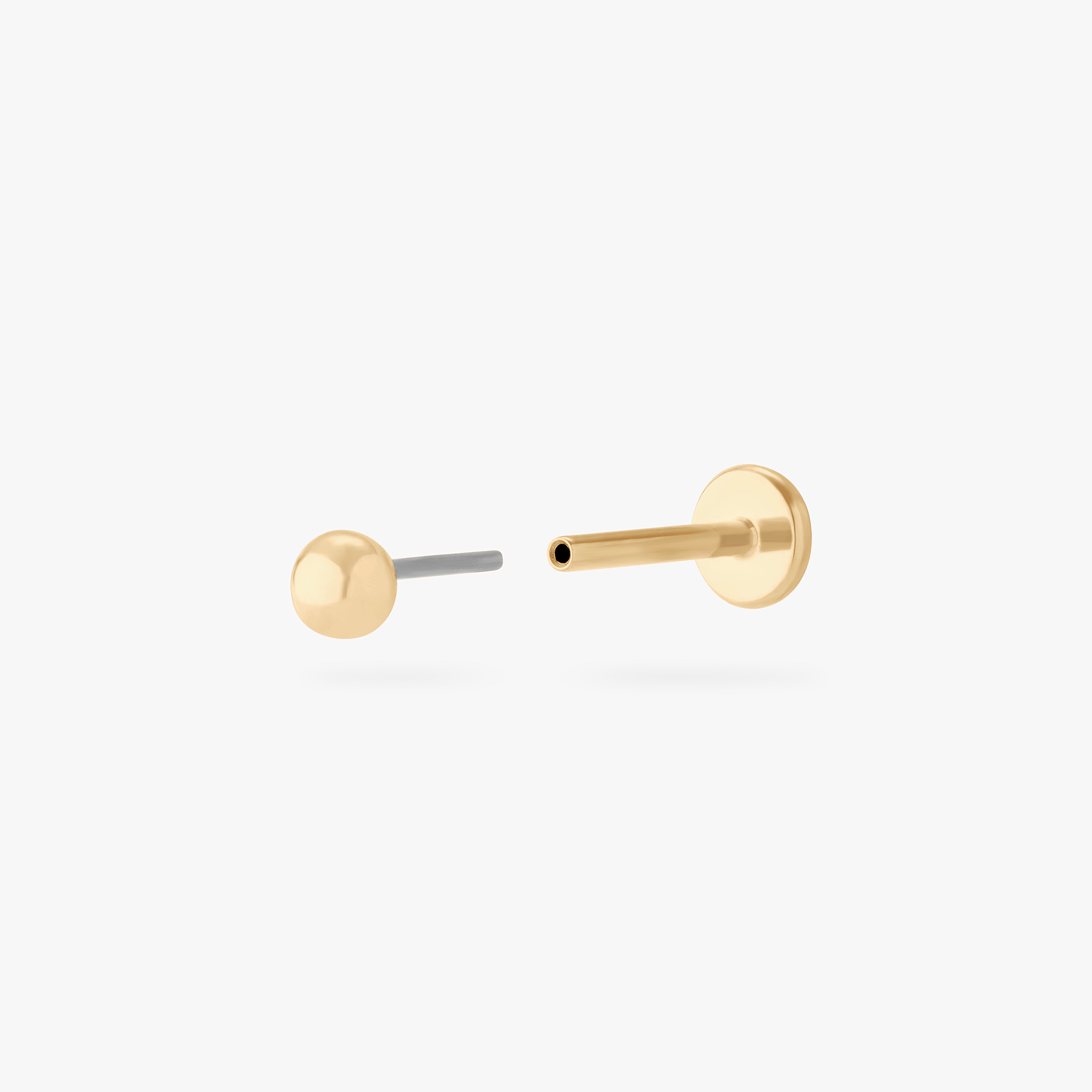 This is an image of a 14k gold flatback stud that is a solid gold ball shape. color:null|14k gold