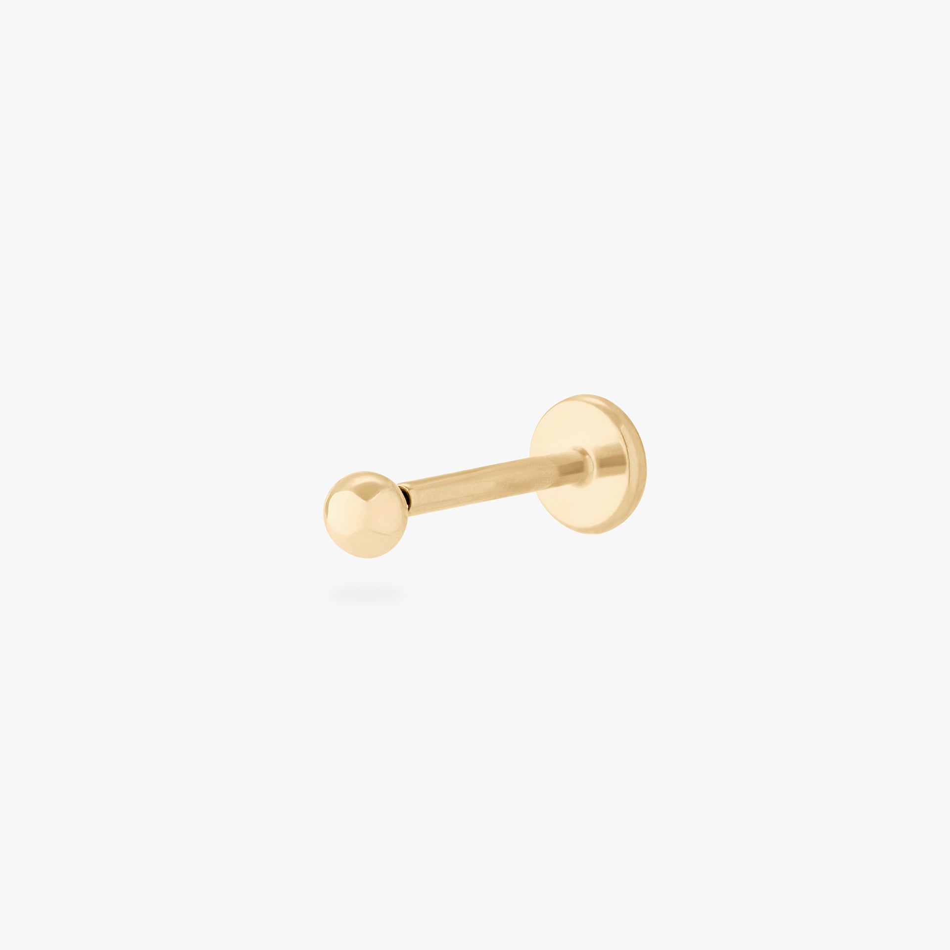 This is an image of a 14k gold flatback stud that is a solid gold ball shape. color:null|14k gold
