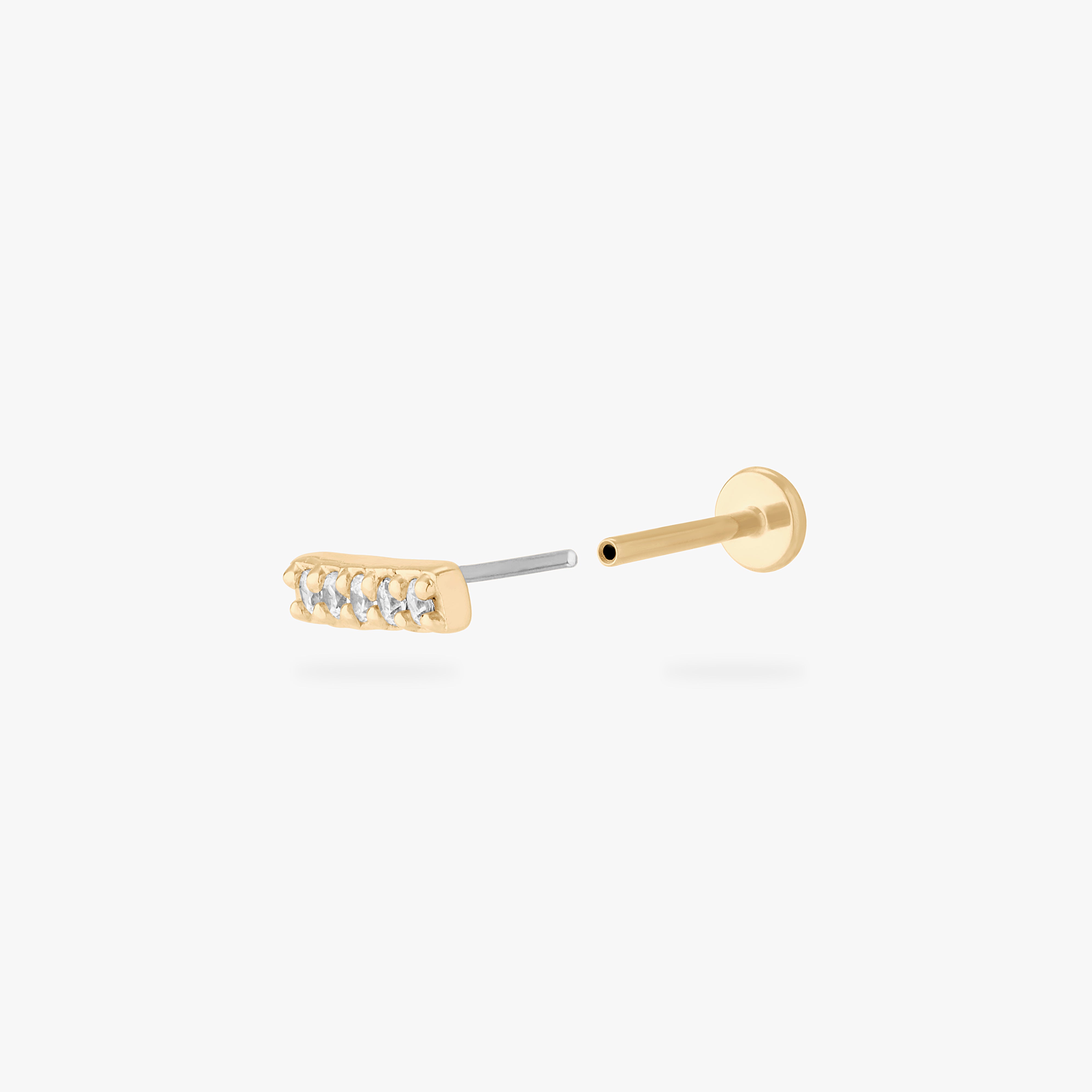 This image shows the front of the 14k pave bar Flatback separated from the labret - Alternative view 2