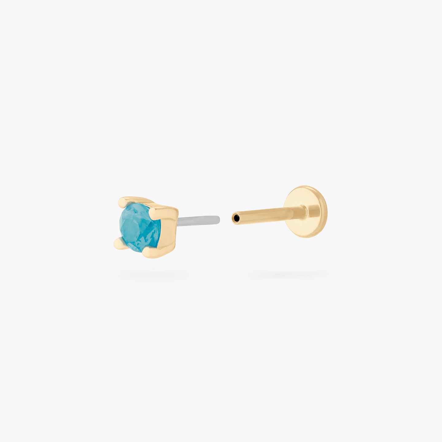 a turquoise mini cz stud set in a 14k gold setting color:null|gold/turquoise