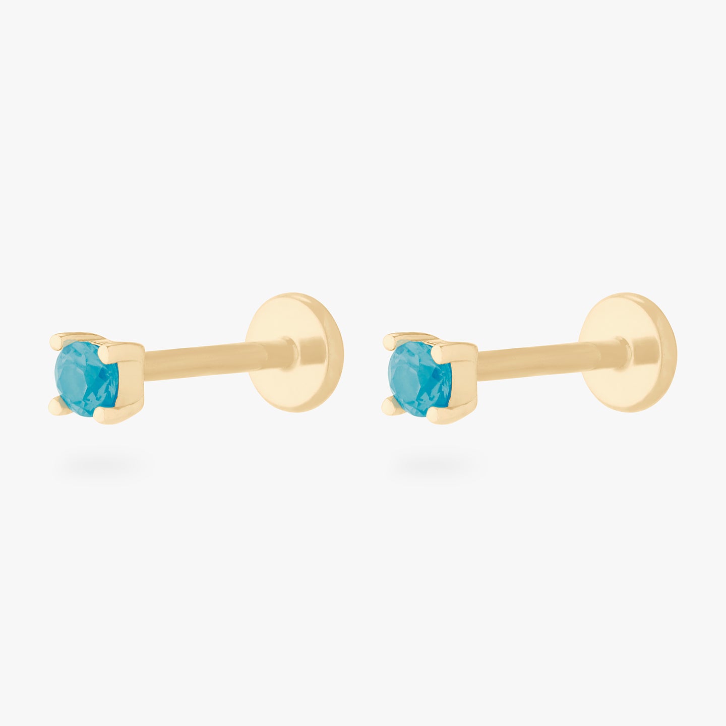 a turquoise mini cz stud set in a 14k gold setting [pair] color:null|gold/turquoise