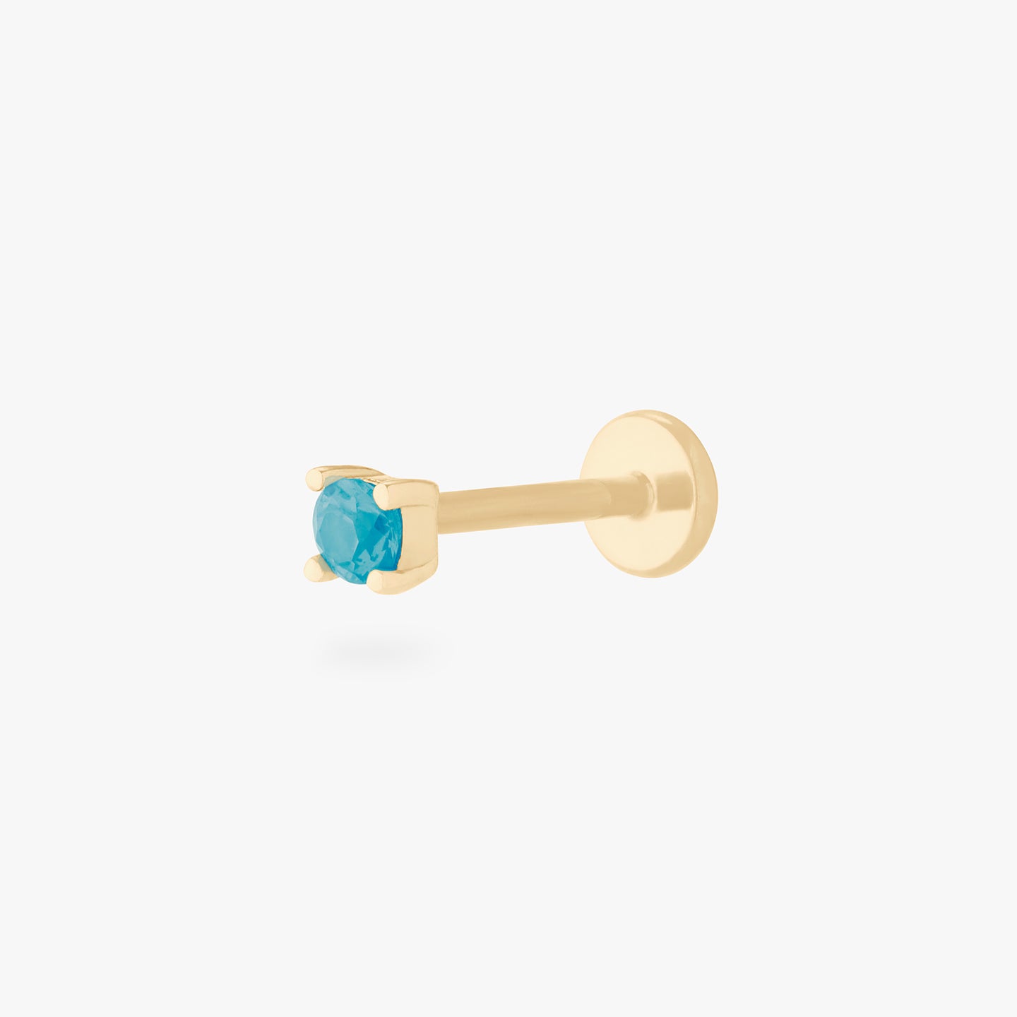 a turquoise mini cz stud set in a 14k gold setting color:null|gold/turquoise