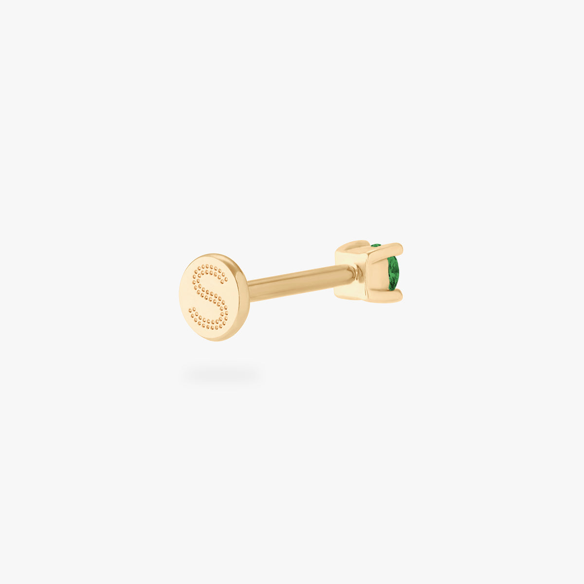 This is an image of a 14k gold flatback with a 2.5mm cz setting and green cz stone. color:null|14k gold|14k gold/green