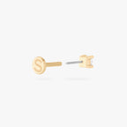 a clear mini cz stud set in a 14k gold setting color:null|gold/clear