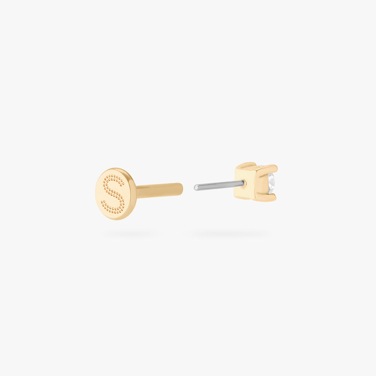 a clear mini cz stud set in a 14k gold setting color:null|gold/clear