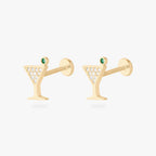 This image shows a pair of 14k yellow gold pave martini flatback studs with a green cz stone. 