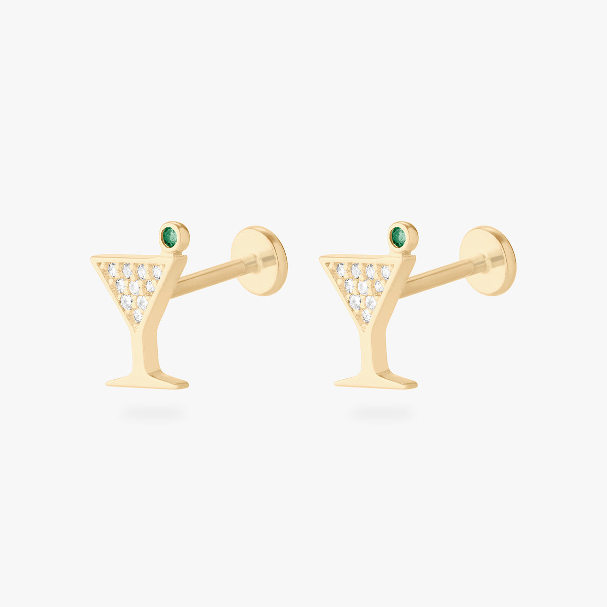 This image shows a pair of 14k yellow gold pave martini flatback studs with a green cz stone. 