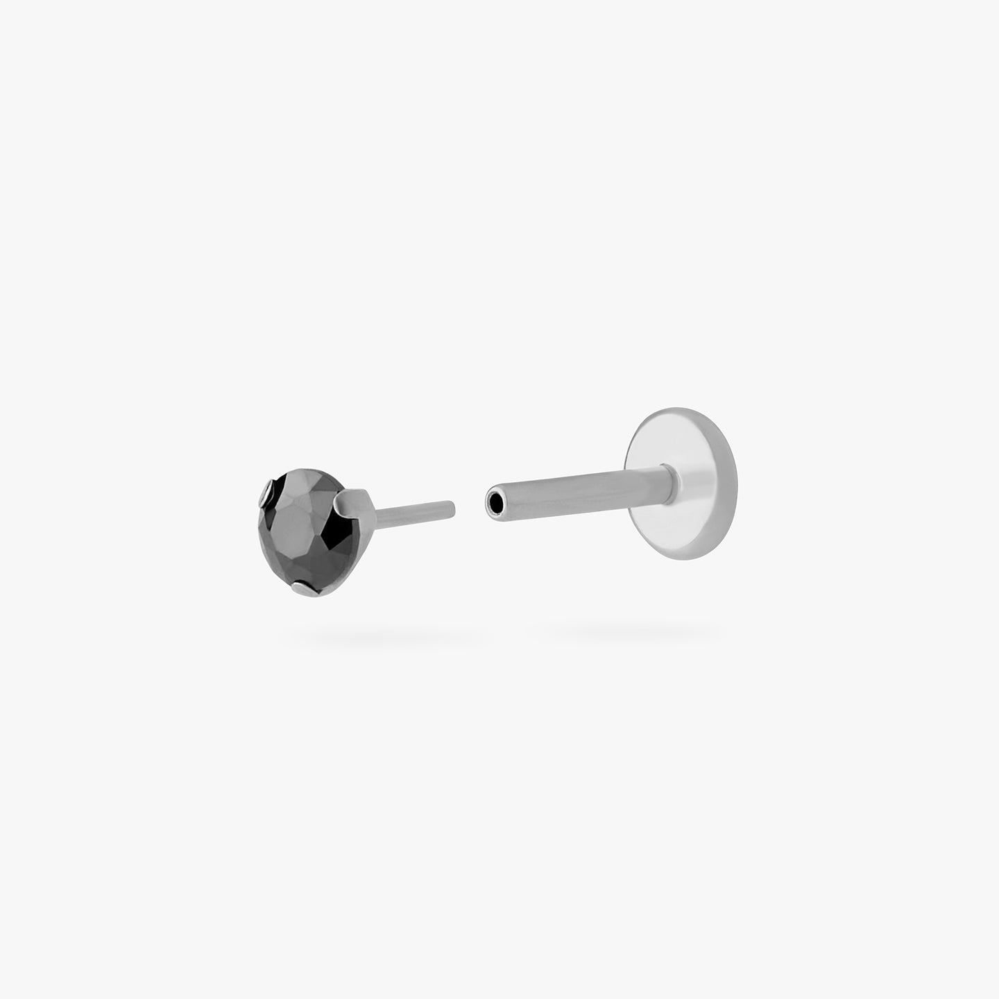 titanium flatback stud with a 2.5mm black cz stone that comes with 2 backs in 6mm and 8mm lengths color:null|silver/black