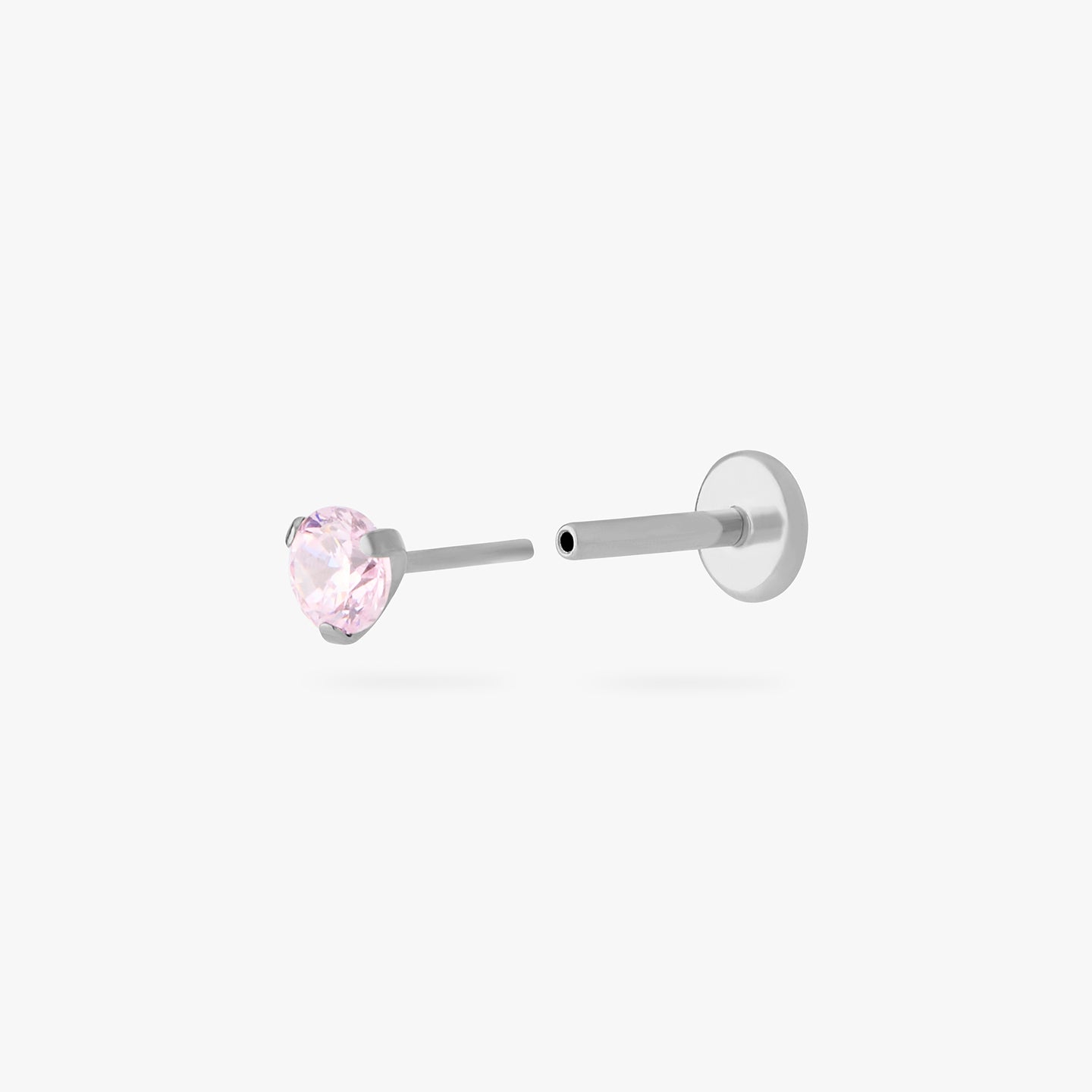 titanium flatback stud with a 2.5mm pink cz stone that comes with 2 backs in 6mm and 8mm lengths color:null|silver/pink