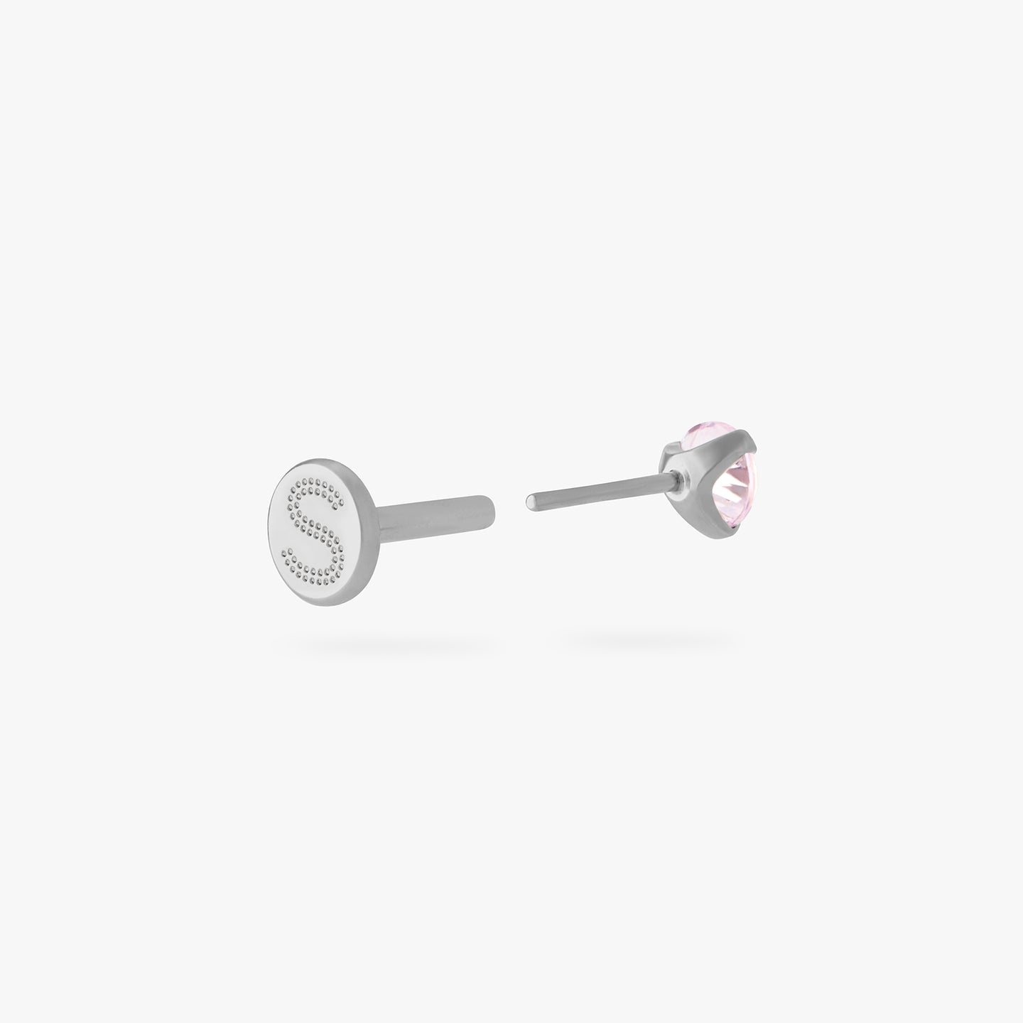 titanium flatback stud with a 2.5mm pink cz stone that comes with 2 backs in 6mm and 8mm lengths color:null|silver/pink