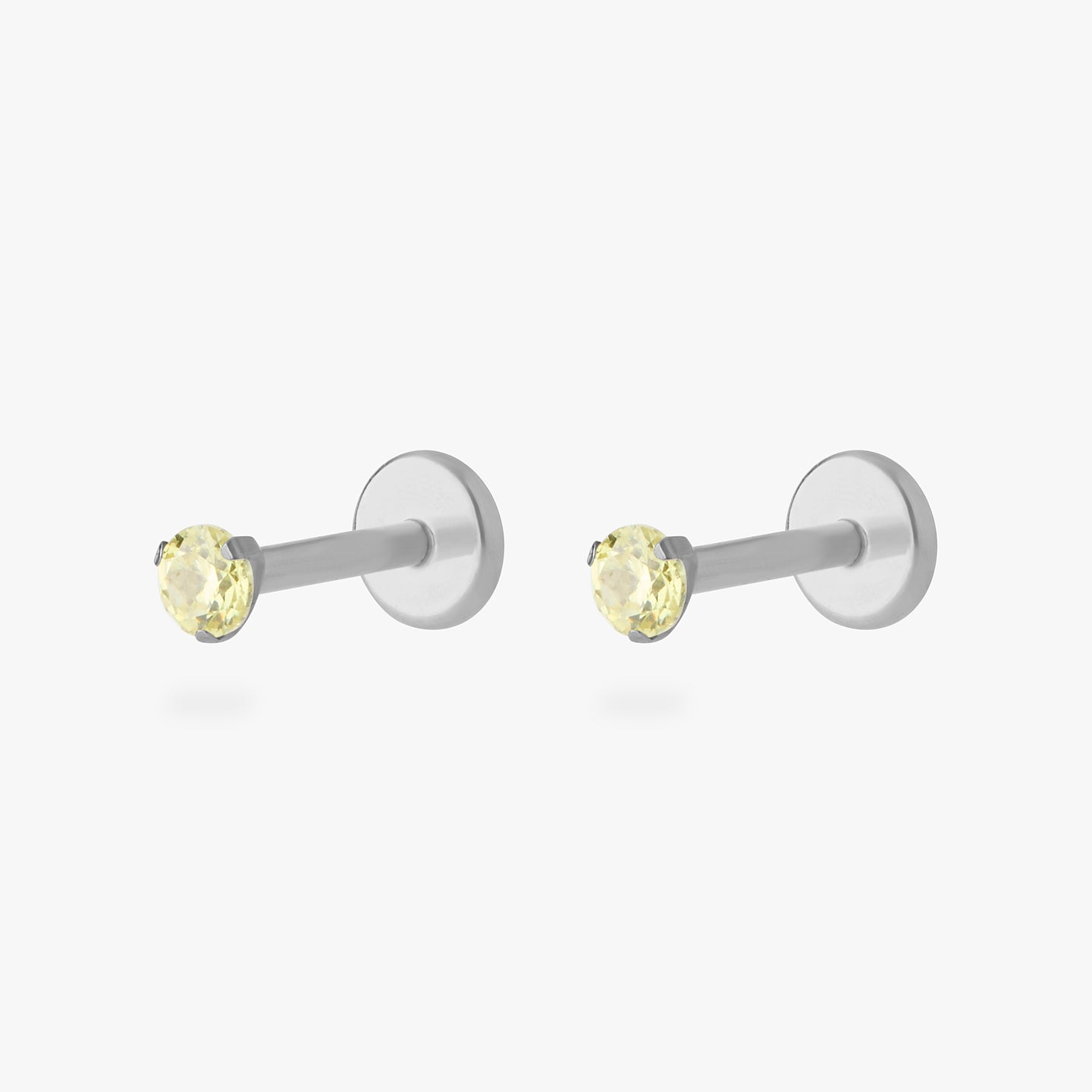 titanium flatback stud with a 2.5mm yellow cz stone that comes with 2 backs in 6mm and 8mm lengths [pair] color:null|silver/yellow