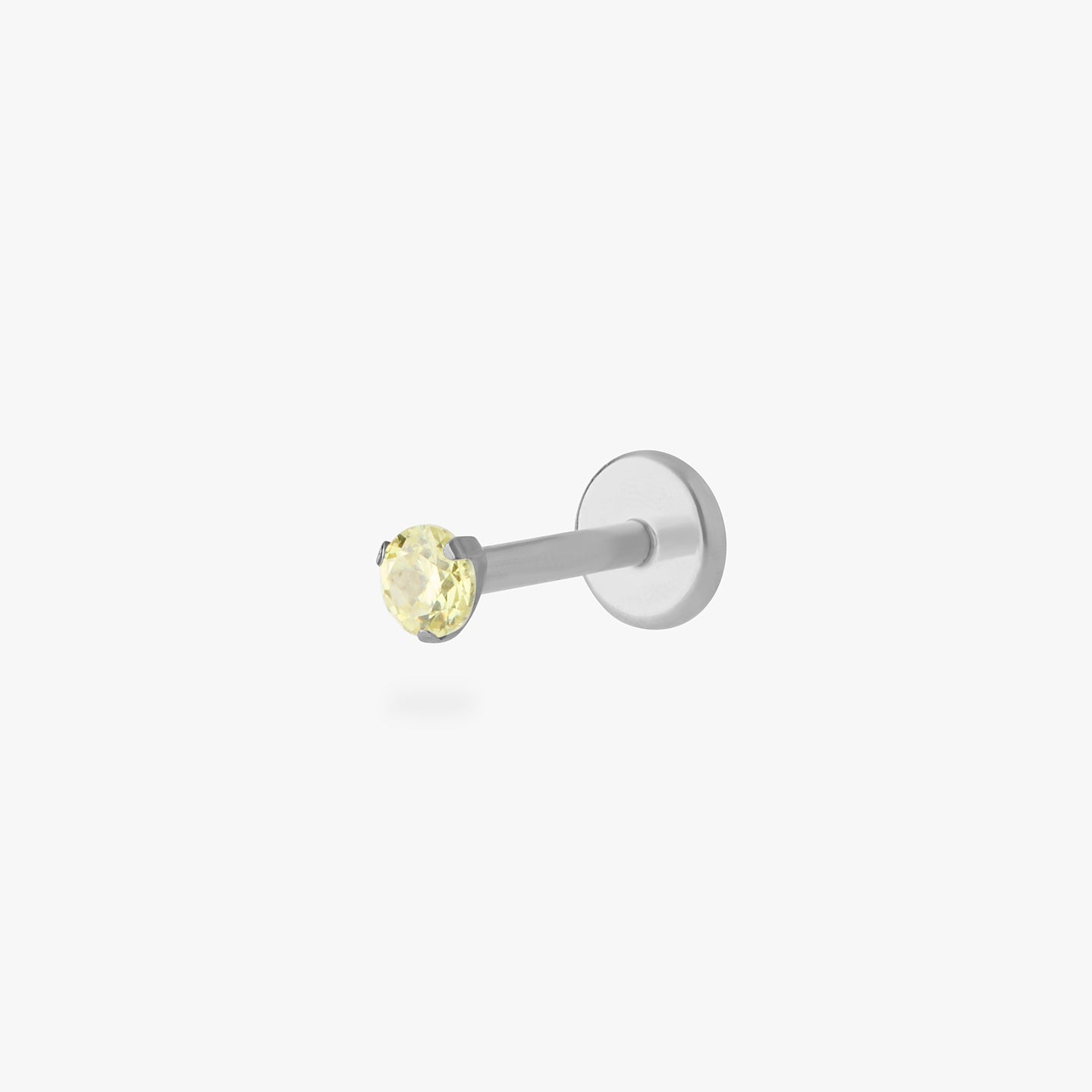 titanium flatback stud with a 2.5mm yellow cz stone that comes with 2 backs in 6mm and 8mm lengths color:null|silver/yellow