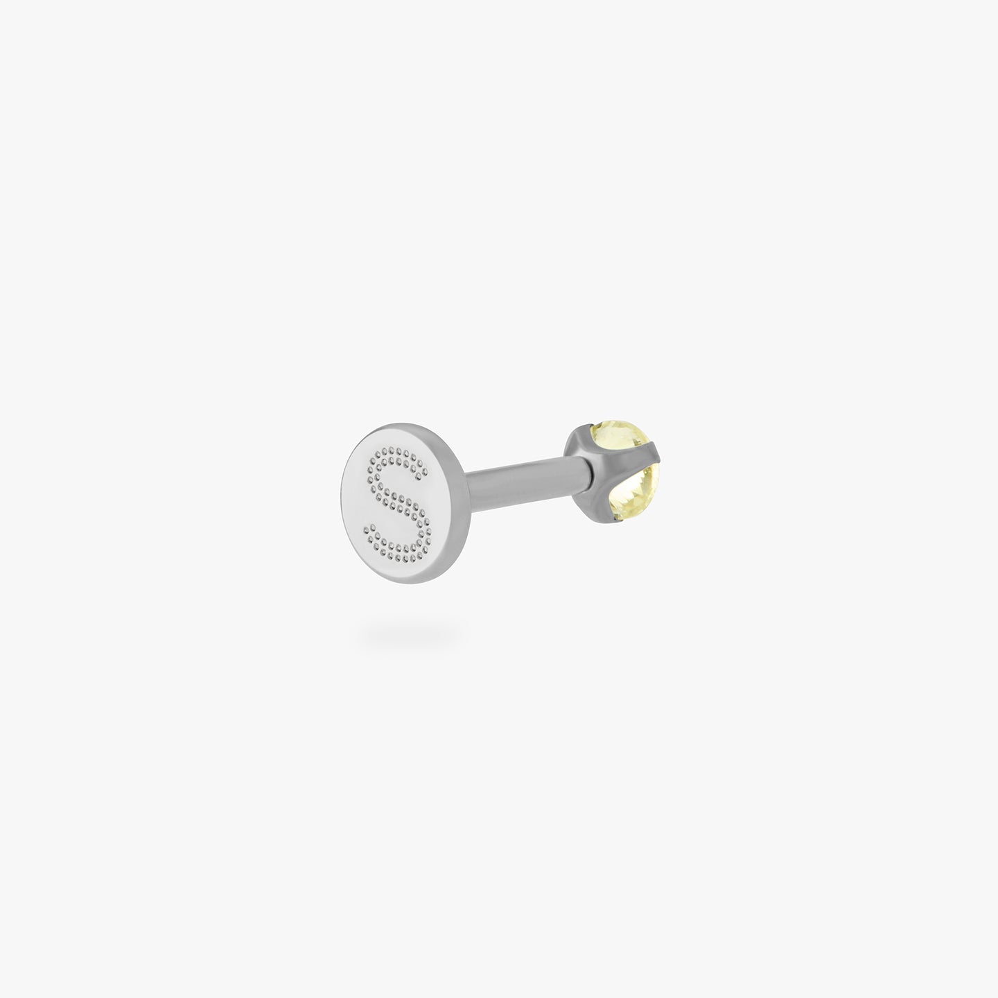 titanium flatback stud with a 2.5mm yellow cz stone that comes with 2 backs in 6mm and 8mm lengths color:null|silver/yellow