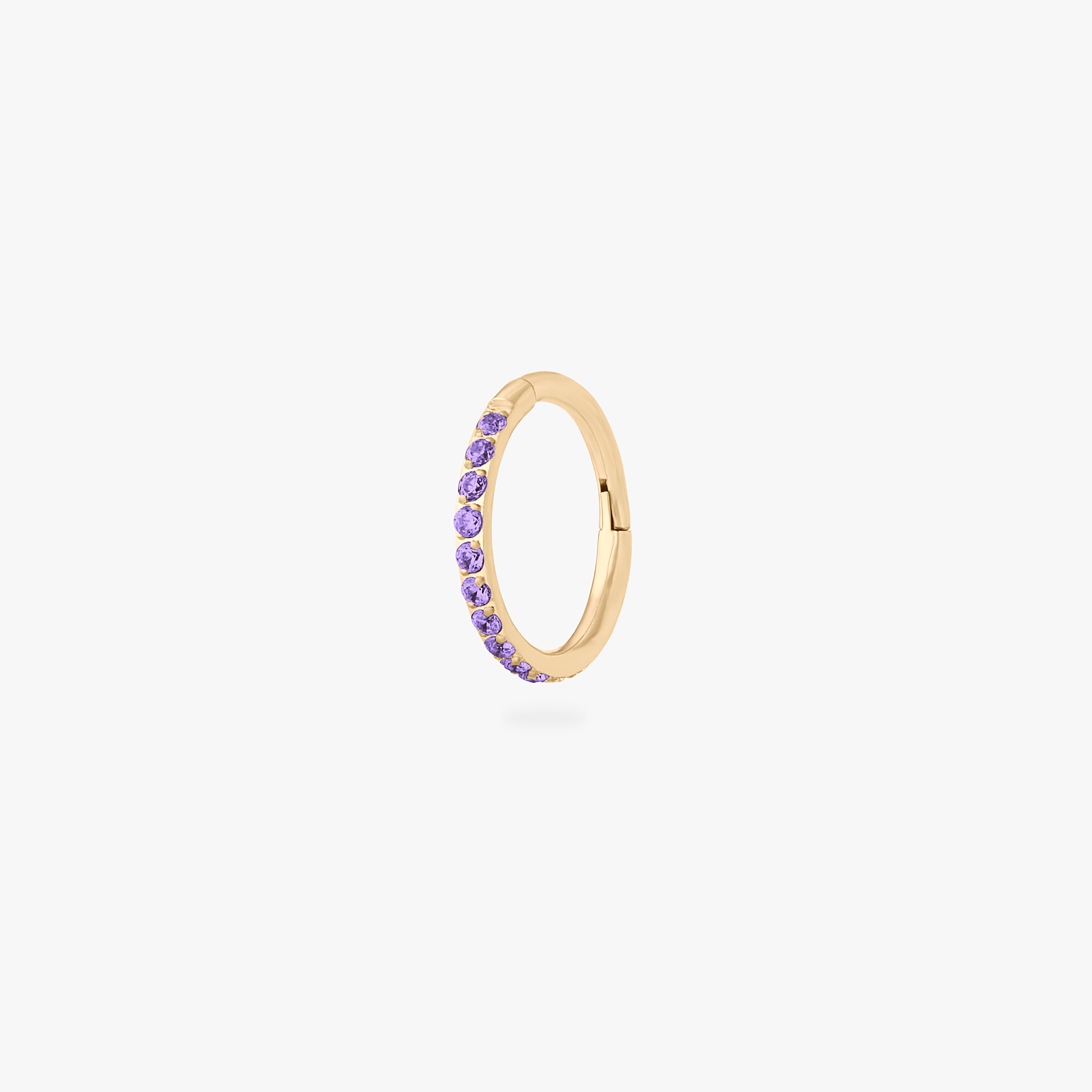 This is a gold toned clicker with amethyst cz stones. color:null|amethyst