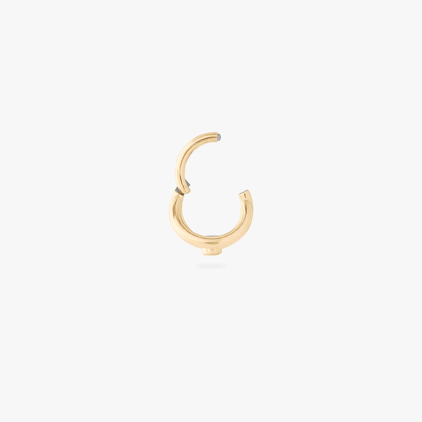 double clicker with a small bezel stone accent in gold color:null|gold/clear