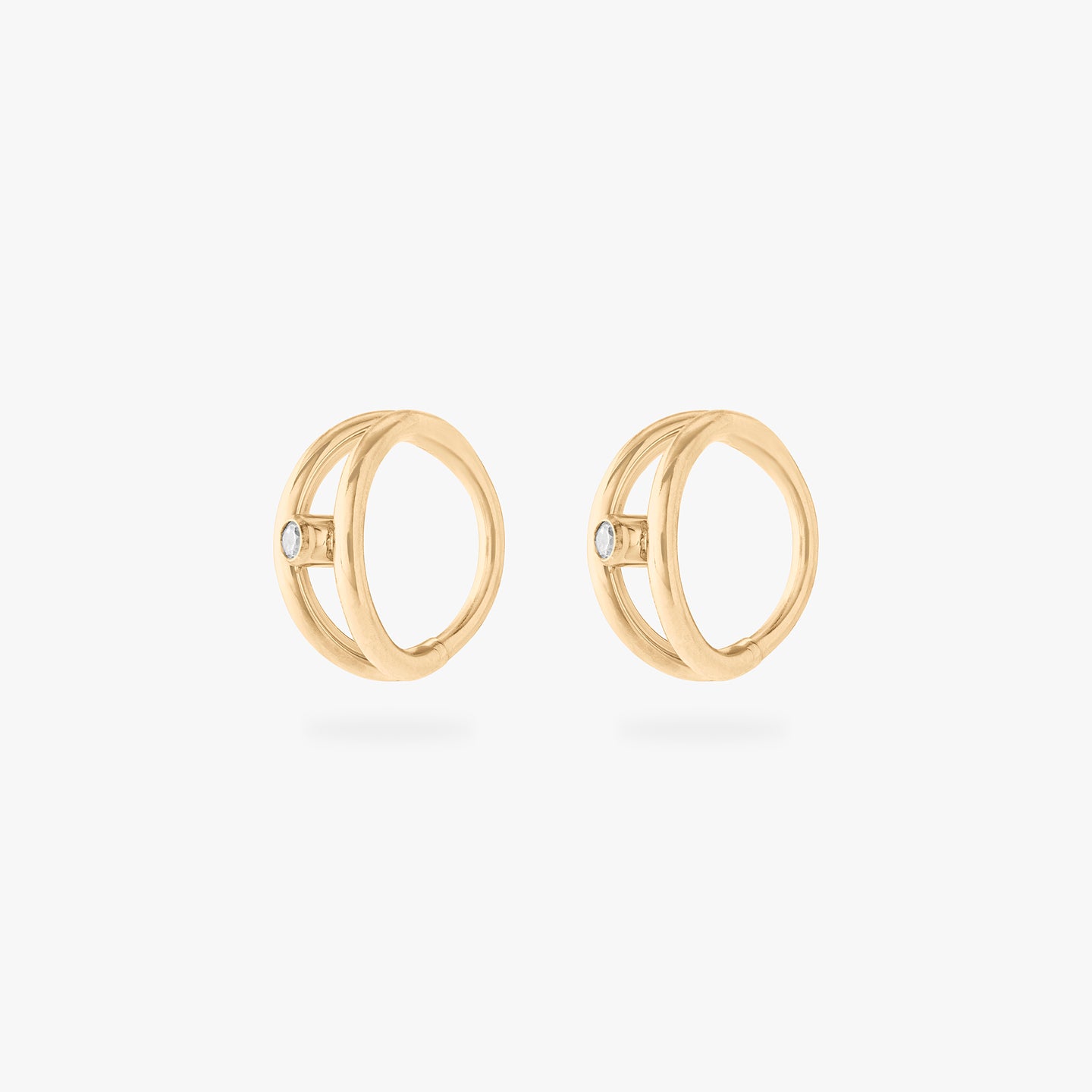 gold double clicker with a small bezel stone accent in gold [pair] color:null|gold/clear