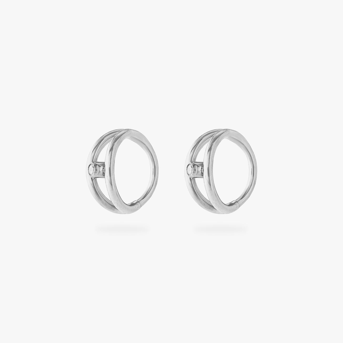 silver double clicker with a small bezel stone accent in gold [pair] color:null|silver/clear