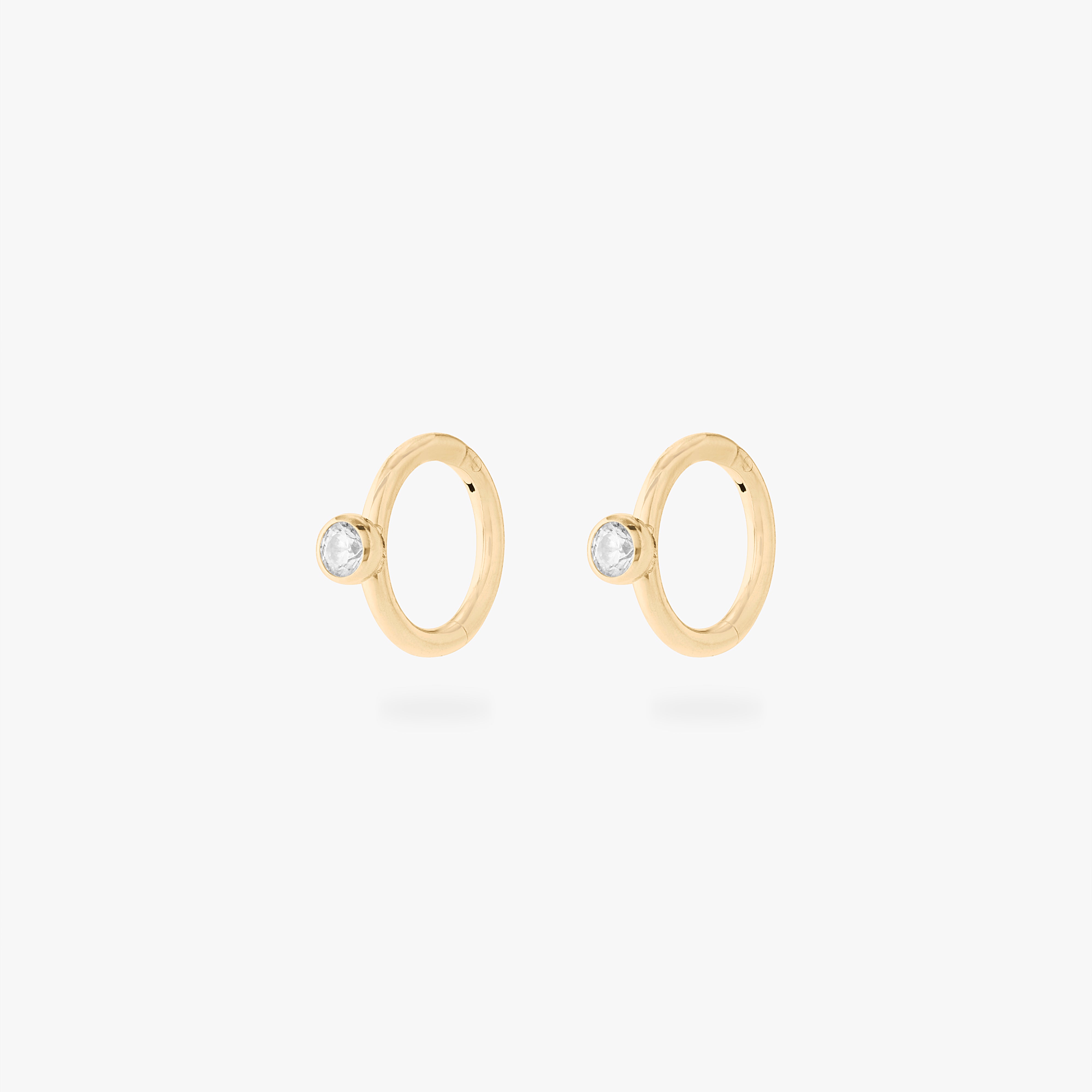 gold 6mm clicker with a clear bezel cz accent [pair] color:null|gold/clear