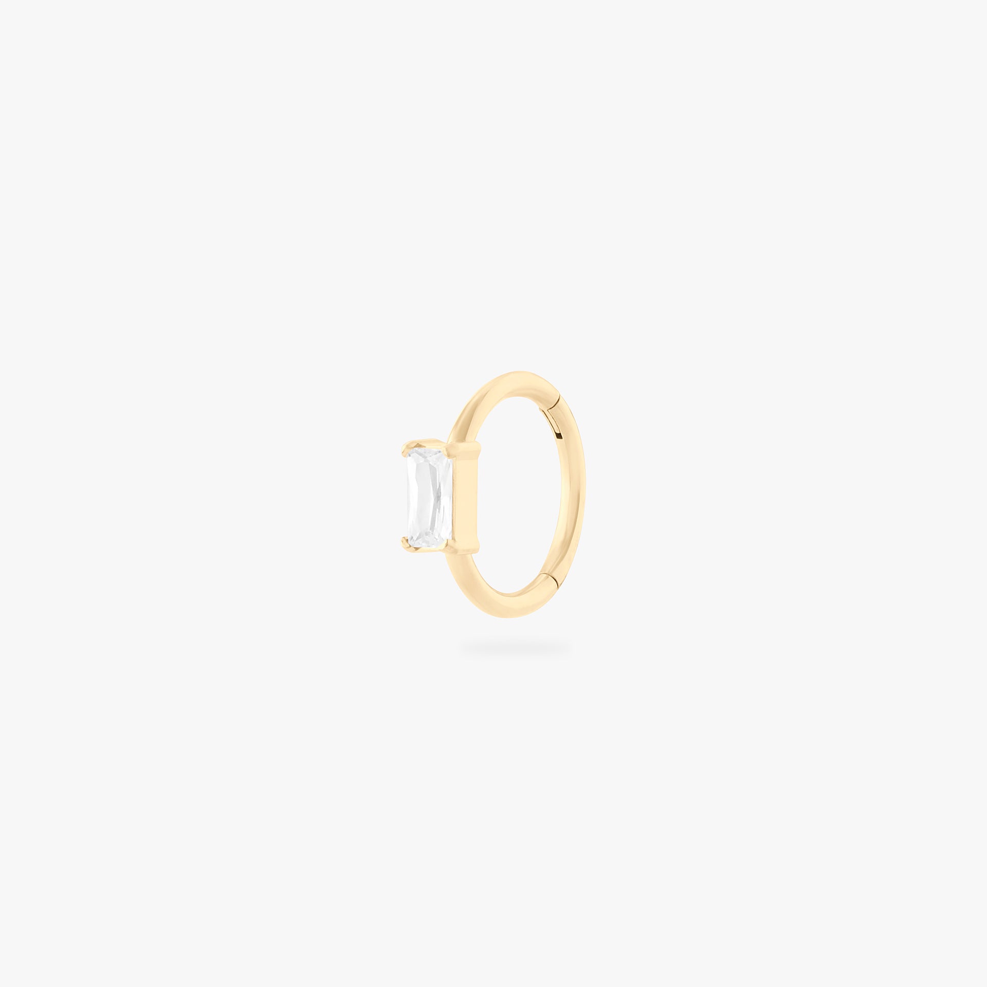 gold clicker with cz baguette stone in 8mm - Main view