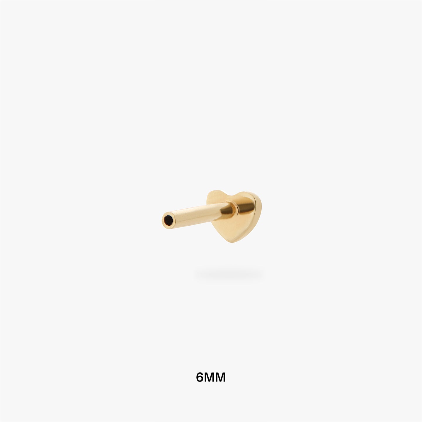 An image of a gold heart shaped flatback post that is 6mm in length. color:null|6mm length
