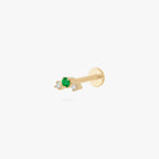 this image shows a side view of a gold plated flatback with one green cz stone in the middle and two clear cz stones on the sides. 