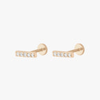 this image shows the side view of a pair of the golden titanium pave flatbacks with clear cz stones 