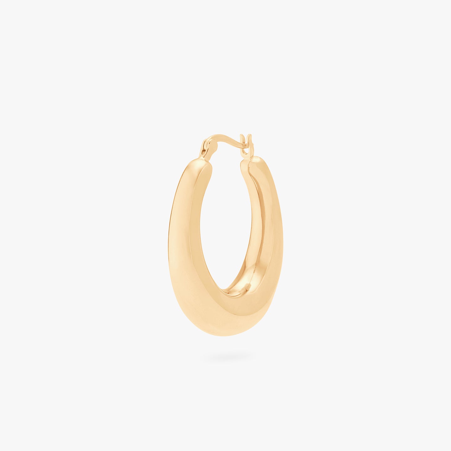 This is a gold, medium-sized, oval crescent shaped hoop. color:null|gold
