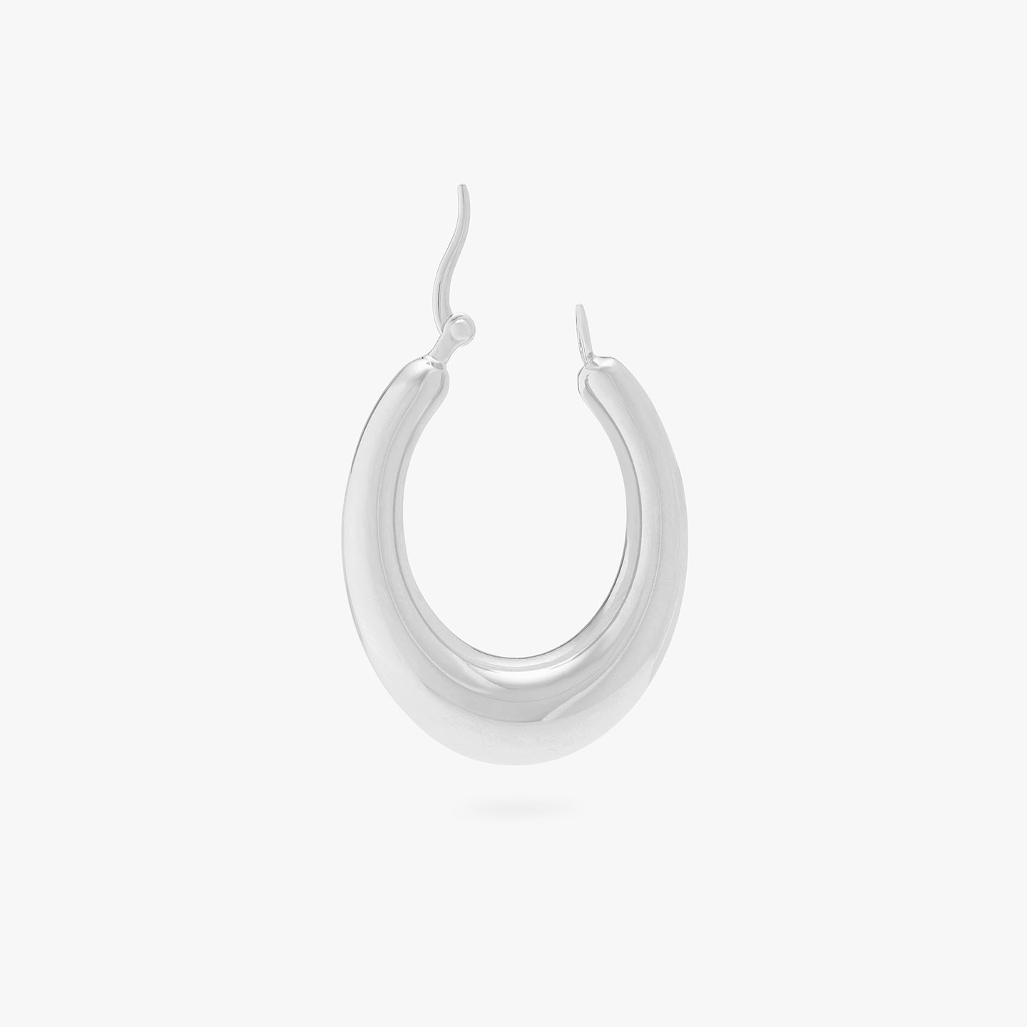 This is a silver, medium-sized, oval crescent shaped hoop unhinged. color:null|silver