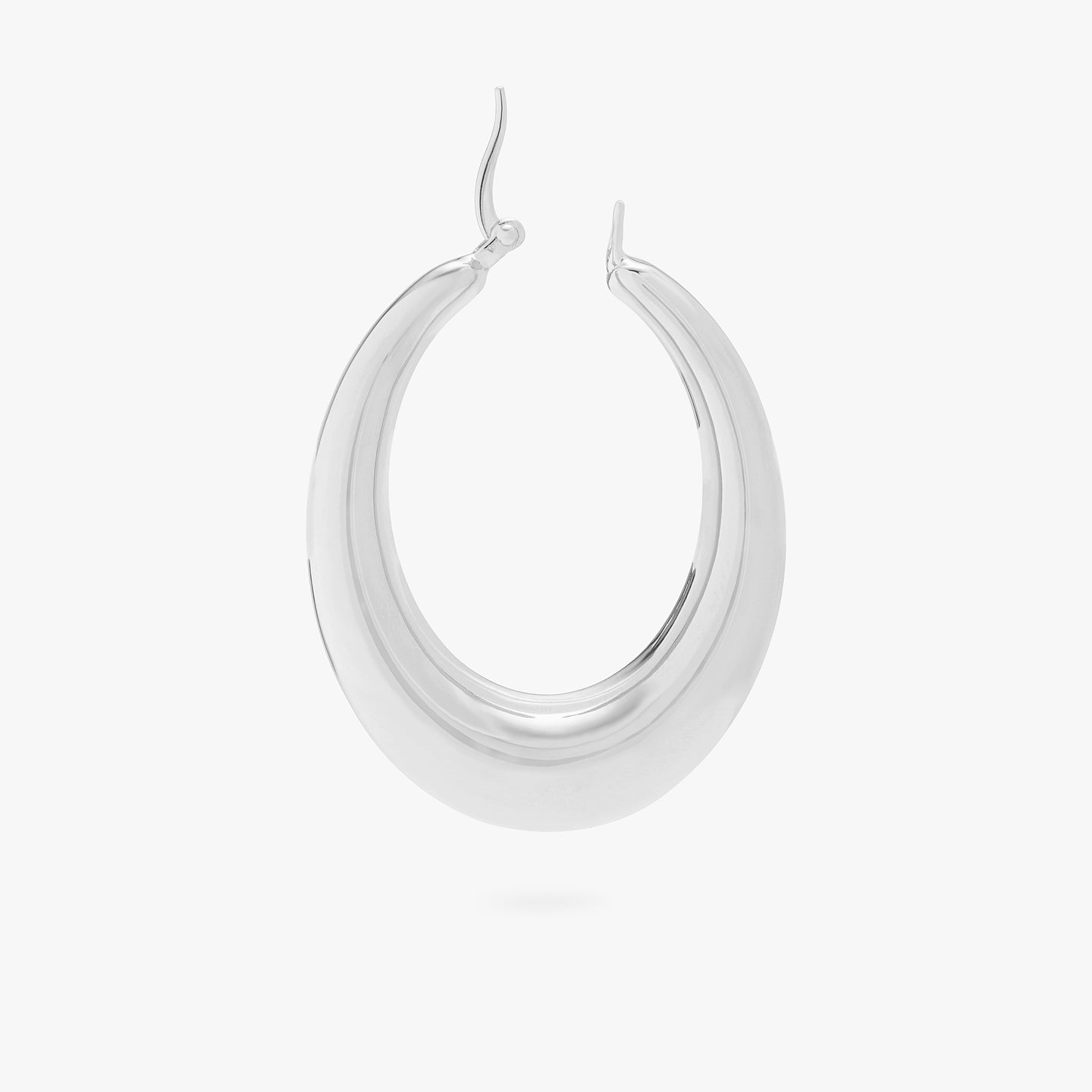 This is a silver, large, oval crescent shaped hoop unhinged. color:null|silver