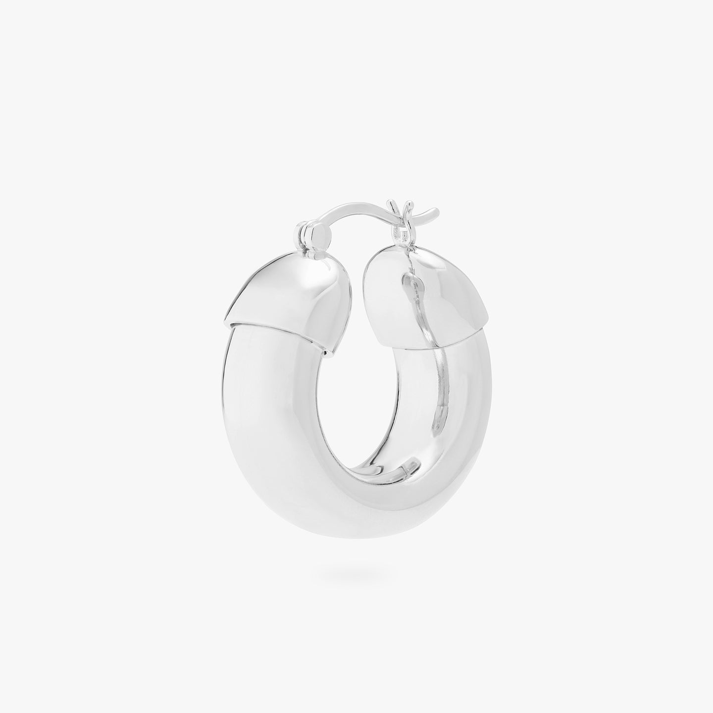 This is an image of a silver, chunky tubed hoop. color:null|silver