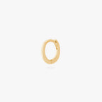 An image of a micro-sized gold huggie (6mm inner diameter). color:null|gold