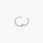 An image of a micro-sized silver huggie (6mm inner diameter) unhinged. color:null|silver