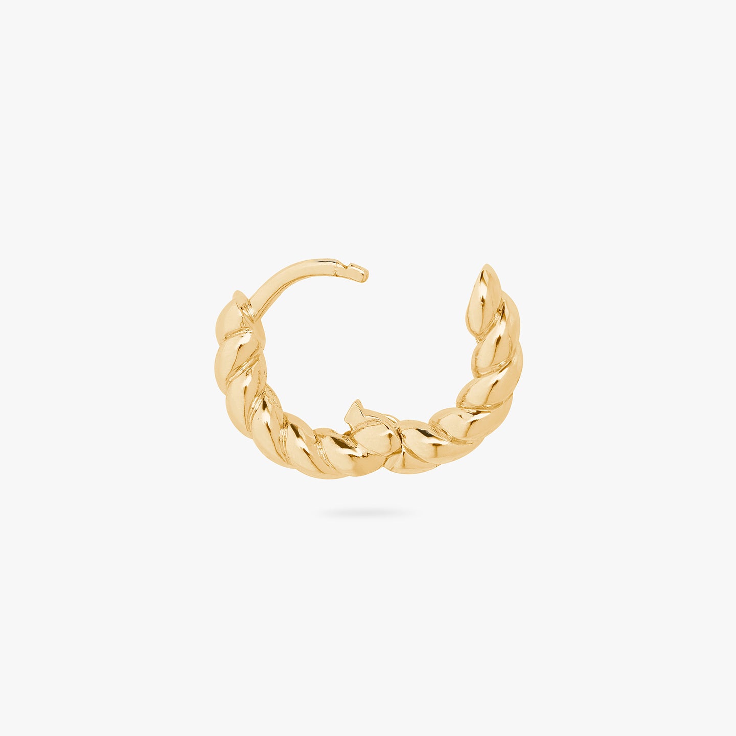 An image of a chunky gold twisted huggie unhinged. color:null|gold
