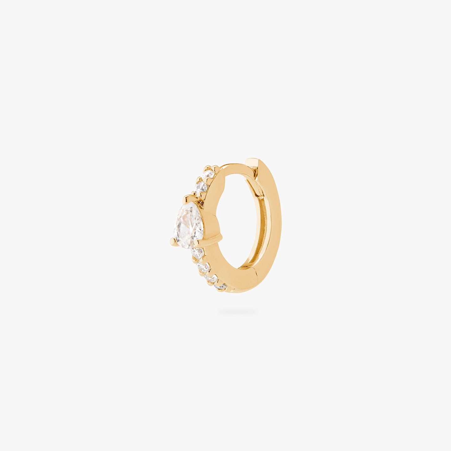 An image of a gold/clear mini pave huggie with a clear pear shaped CZ accent stone. color:null|gold/clear