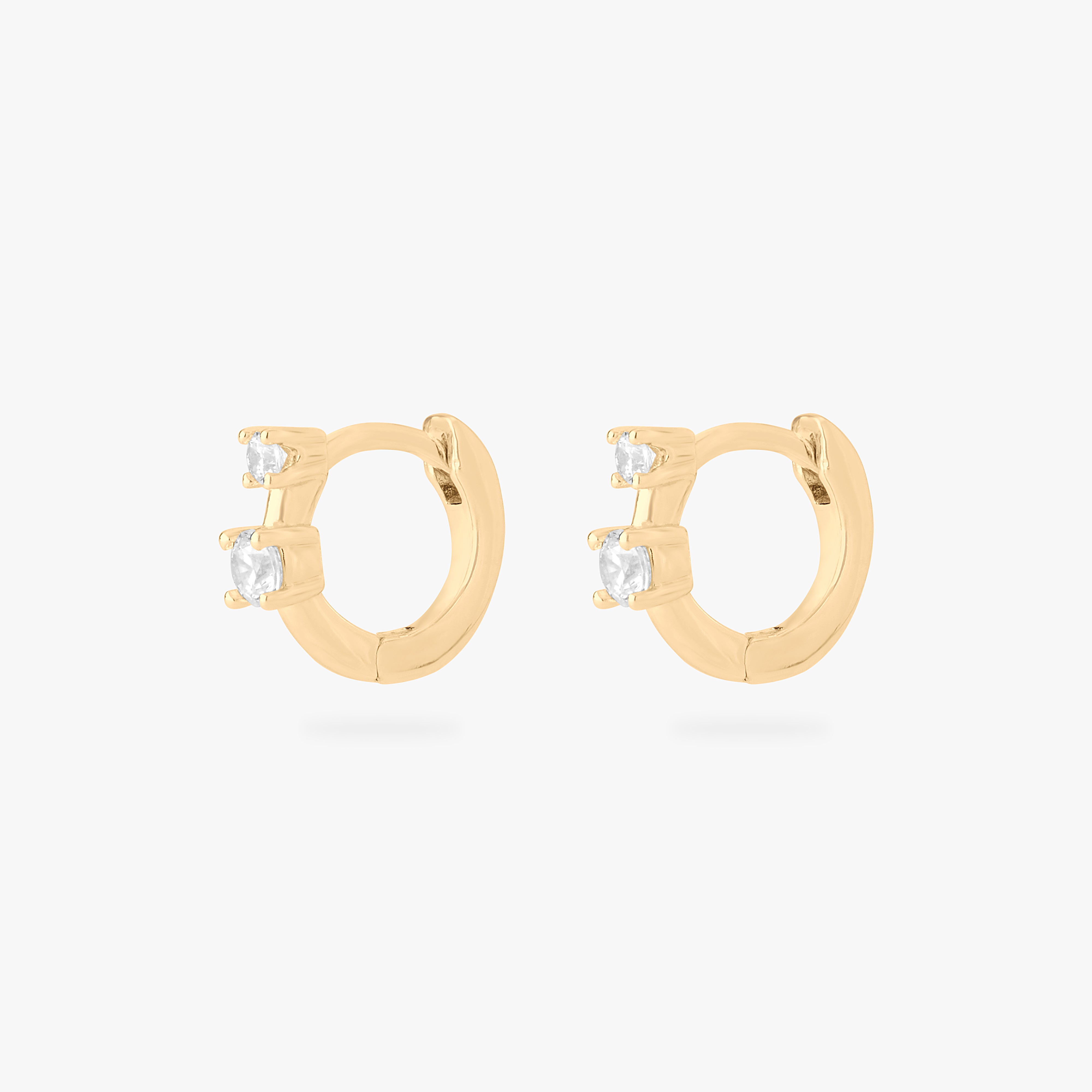 micro huggie in gold with 2 mini cz stones [pair] color:null|gold/clear