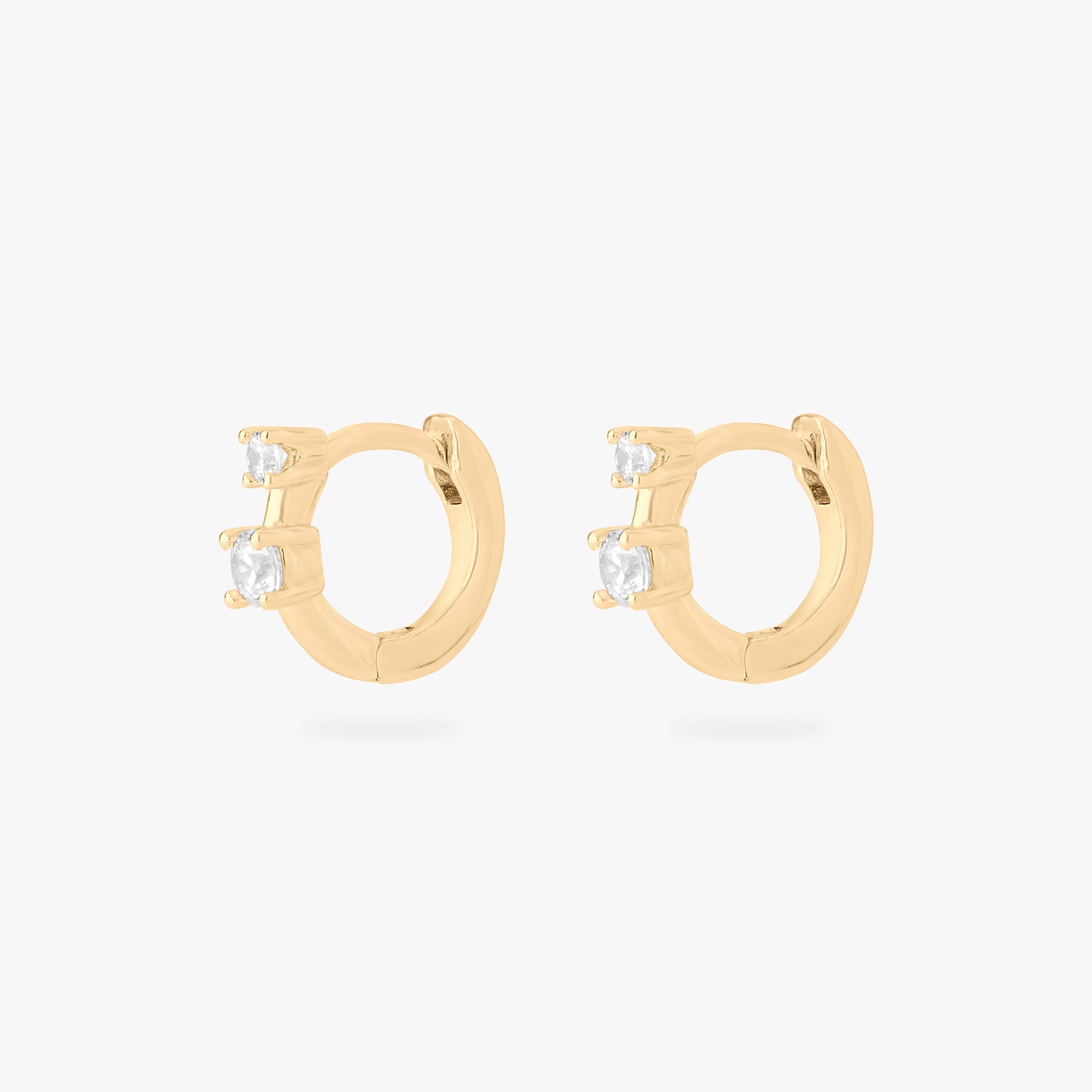 micro huggie in gold with 2 mini cz stones [pair] color:null|gold/clear