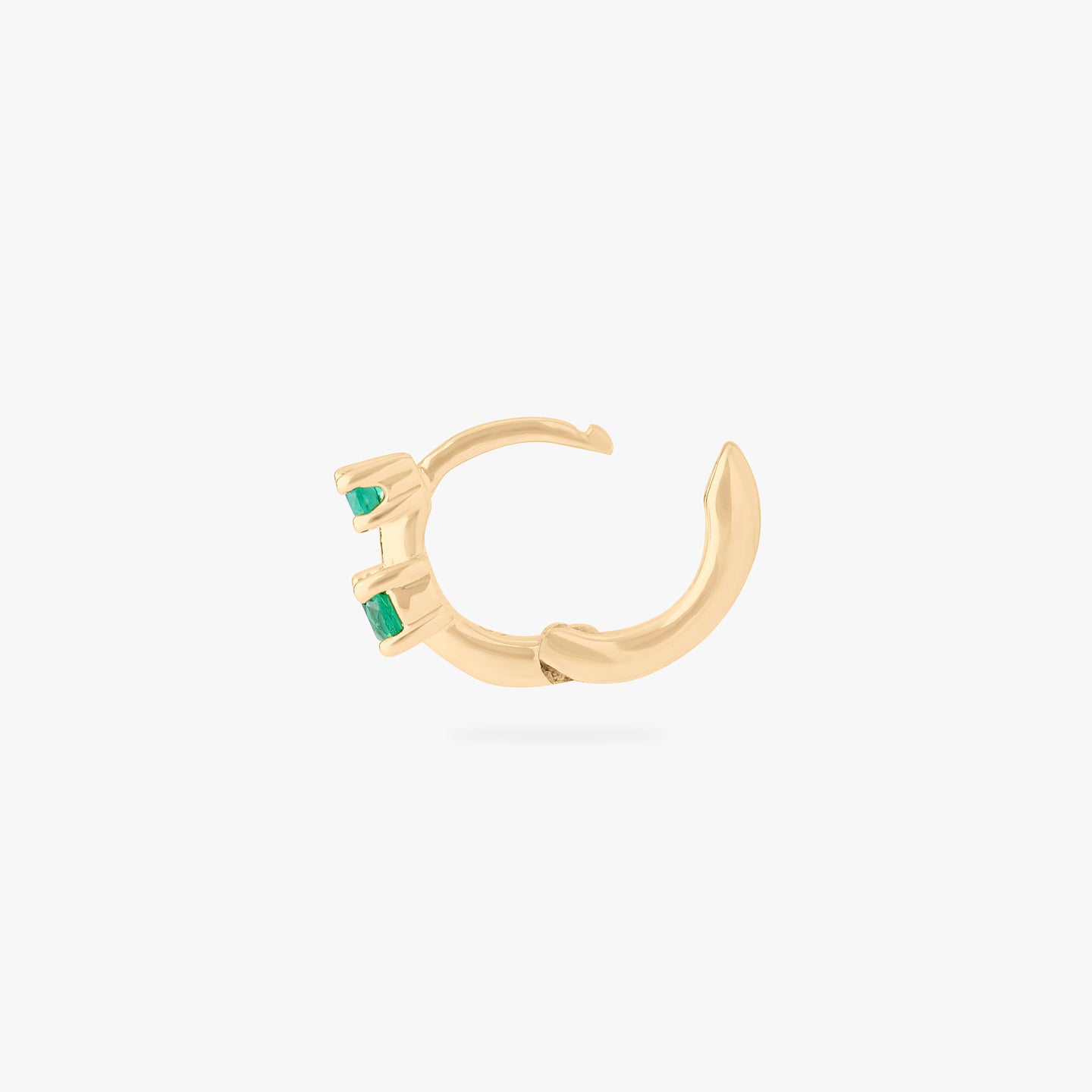 micro huggie in gold with 2 mini green cz stones color:null|gold/green