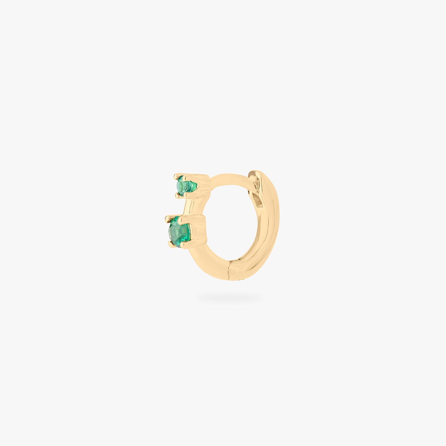 micro huggie in gold with 2 mini green cz stones color:null|gold/green