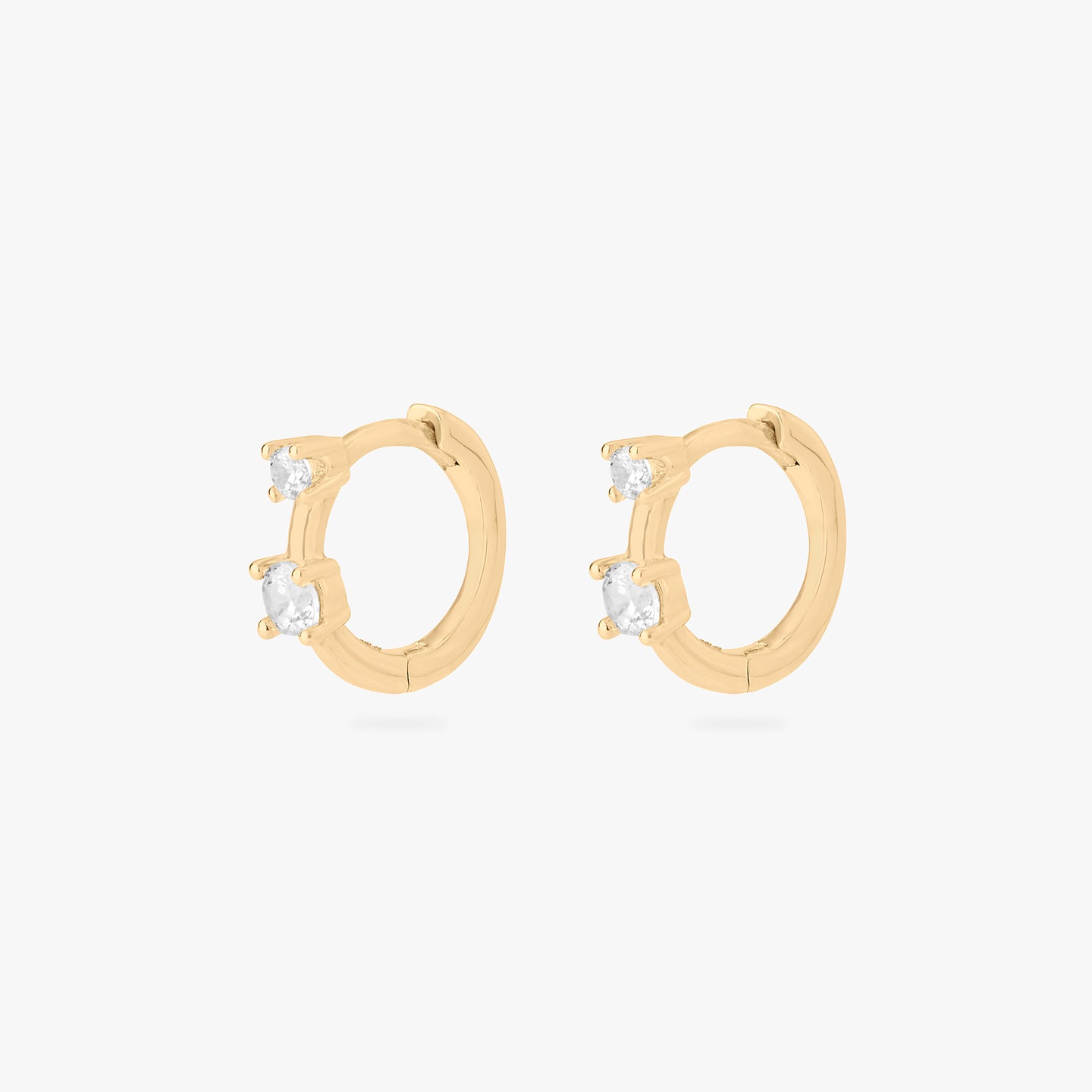 mini huggie in gold with 2 mini cz stones [pair] color:null|gold