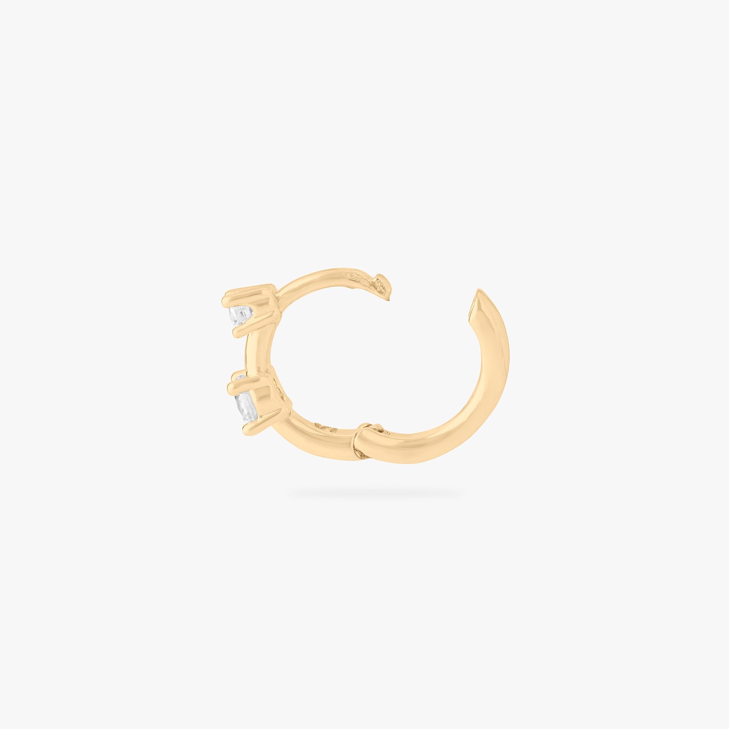 mini huggie in gold with 2 mini cz stones color:null|gold