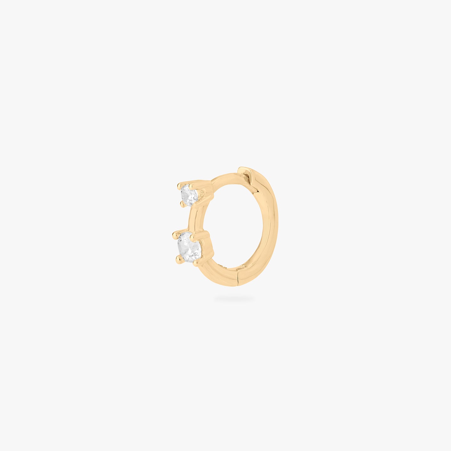 mini huggie in gold with 2 mini cz stones color:null|gold