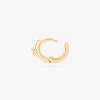 micro huggie with a small bow accent in gold color:null|gold