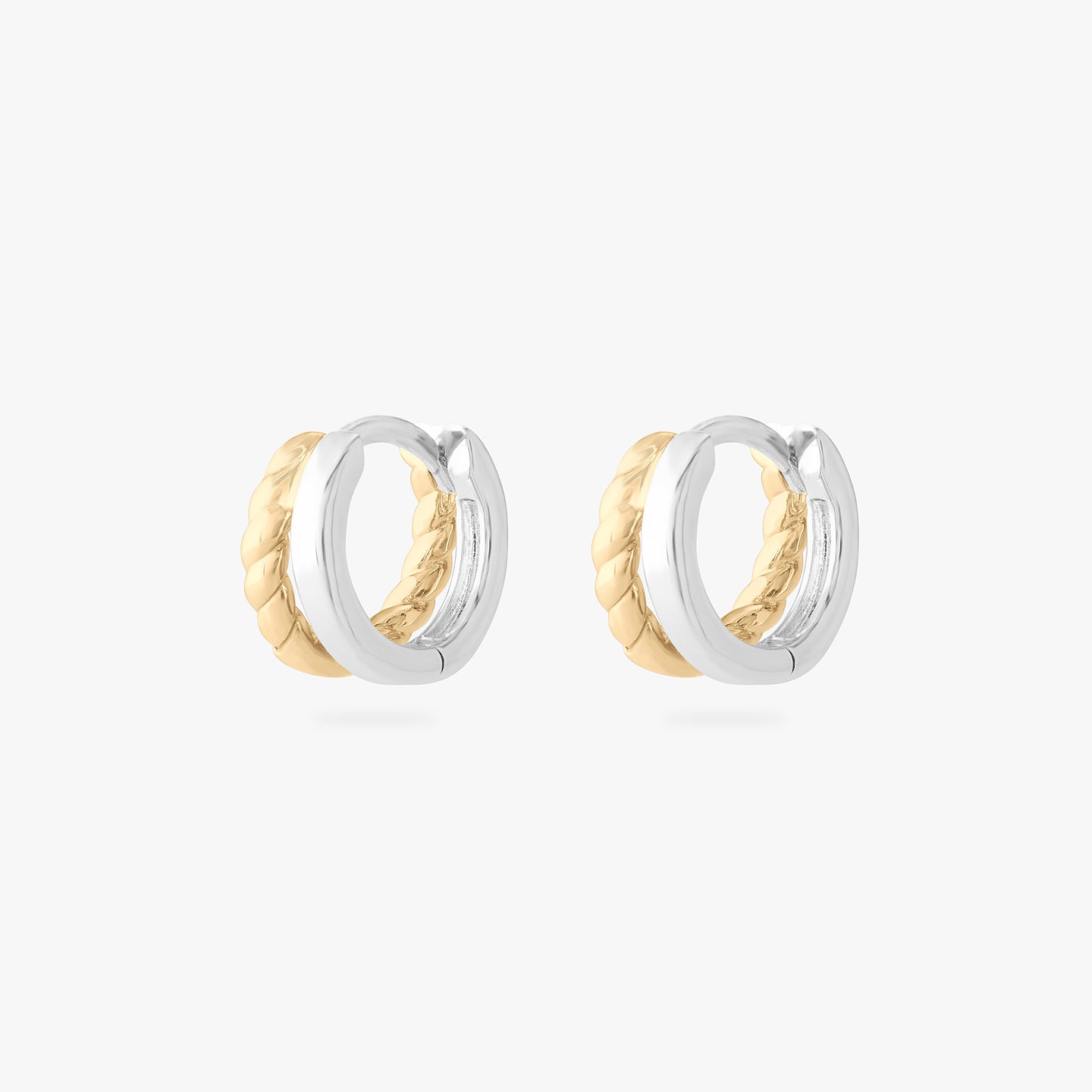 a micro huggie with a gold twist and silver overlapping [pair] color:null|gold/silver