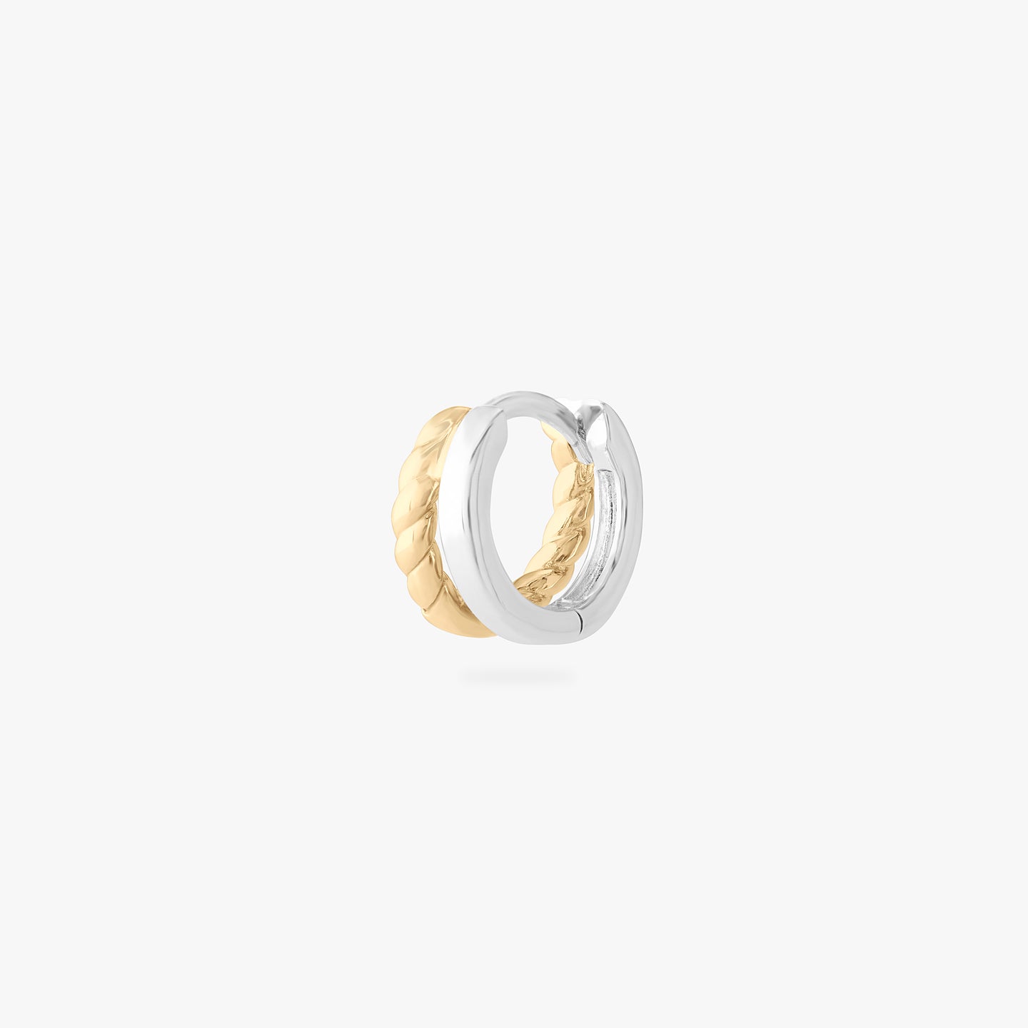 a micro huggie with a gold twist and silver overlapping color:null|gold/silver