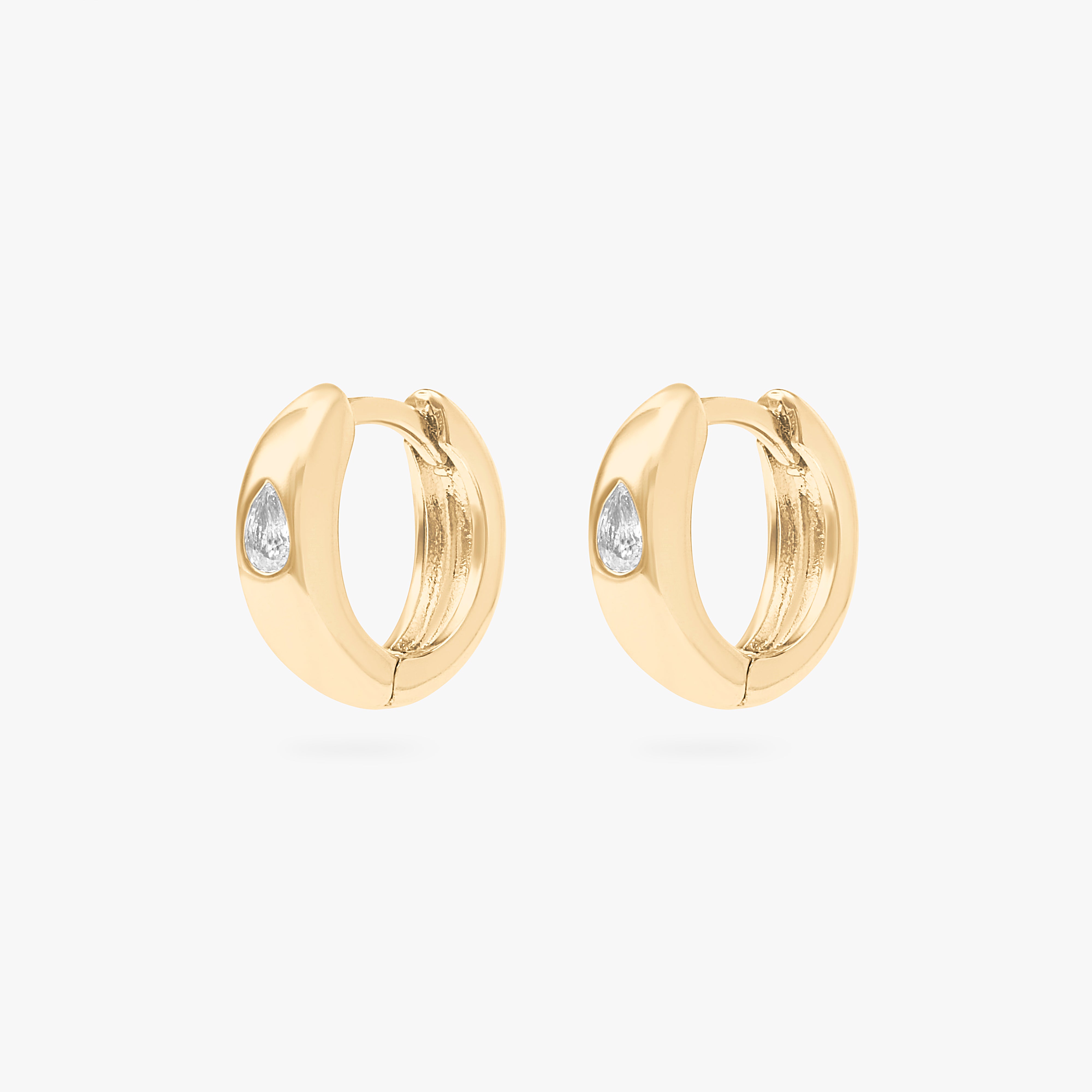 Chunky huggie featuring a set in pear cz stone in gold [pair] color:null|gold