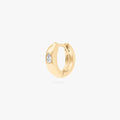 Chunky huggie featuring a set in pear cz stone in gold color:null|gold