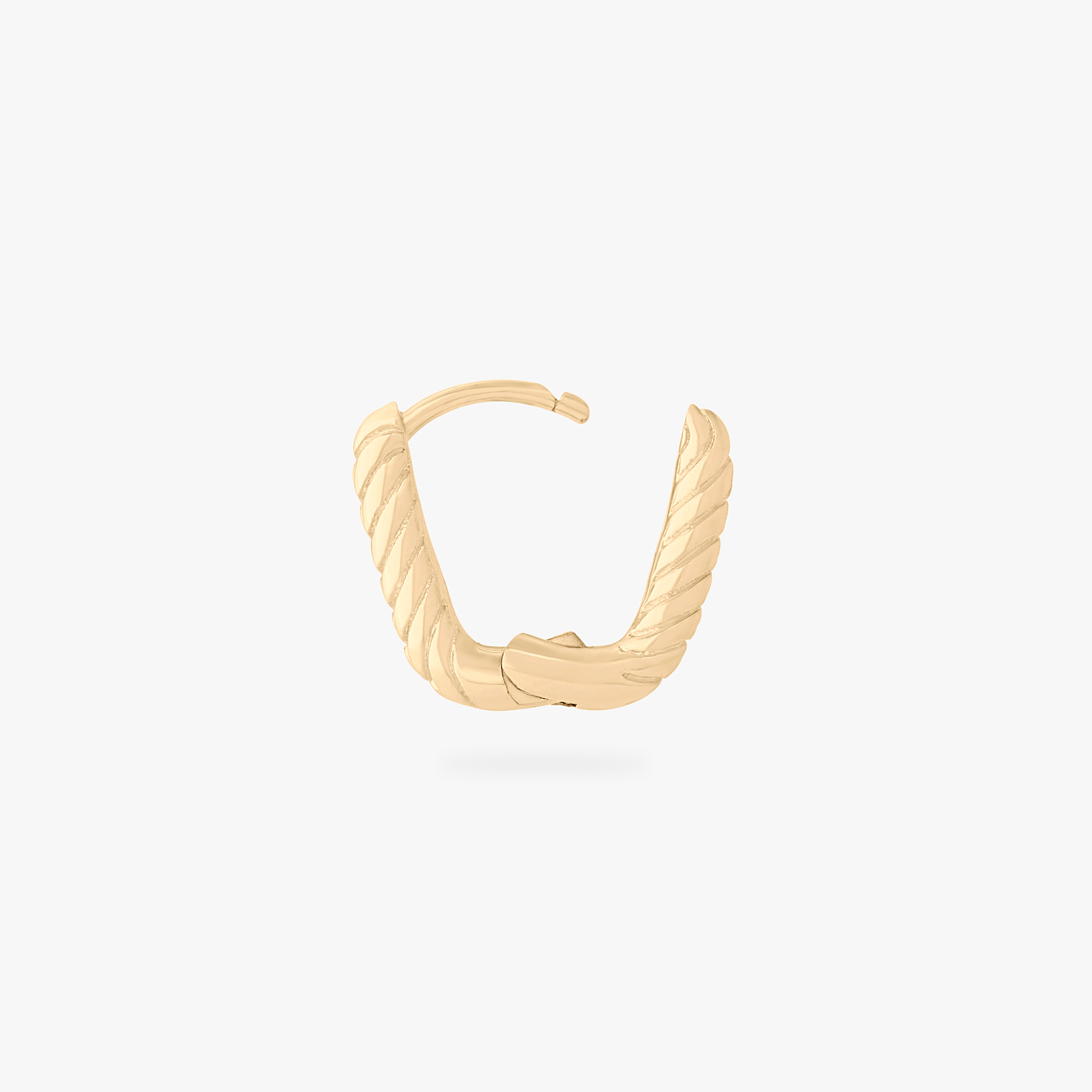 This is an image of a gold-toned, square shaped huggie that has twists throughout it. color:null|gold