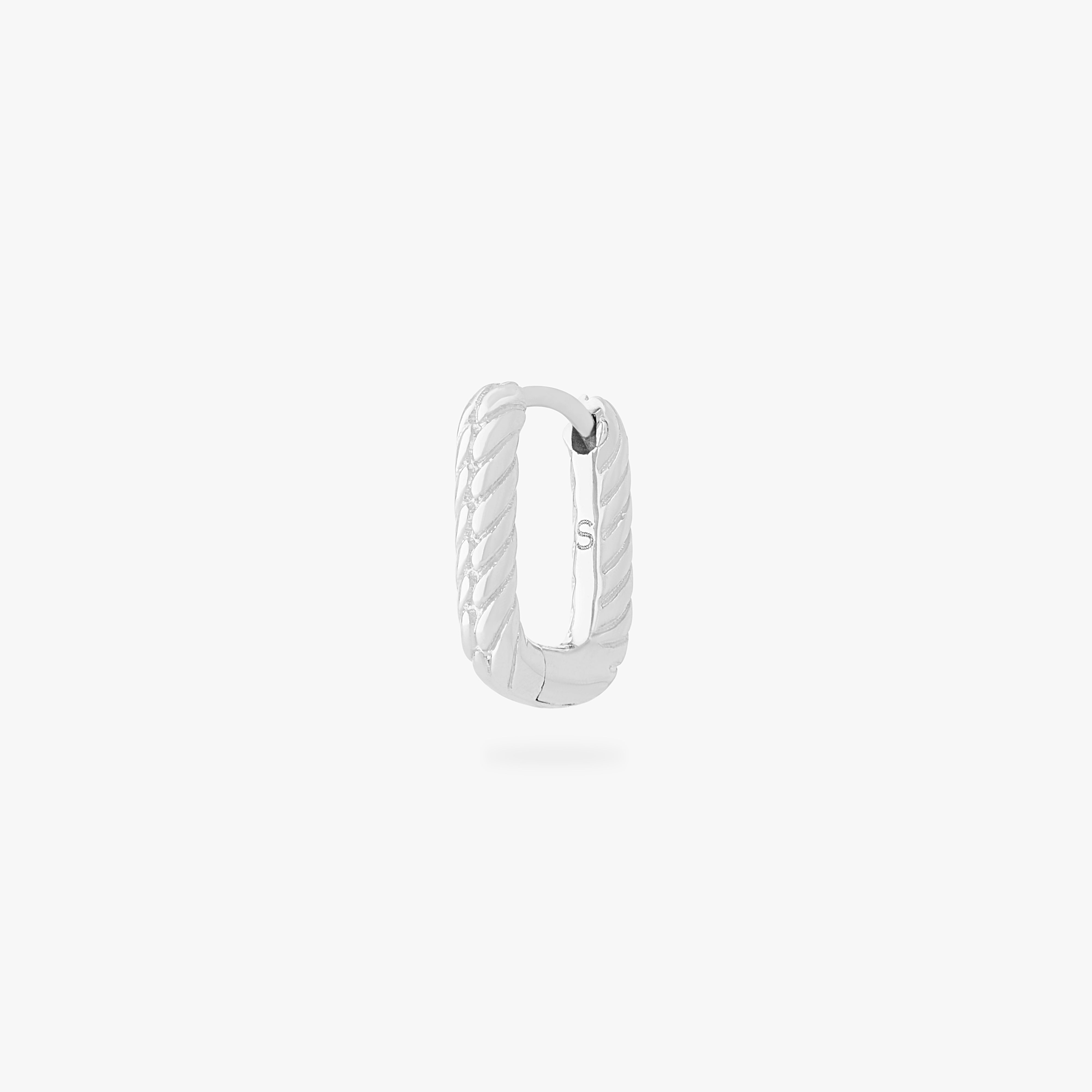 This is an image of a silver-toned, square shaped huggie that has twists throughout it. color:null|silver