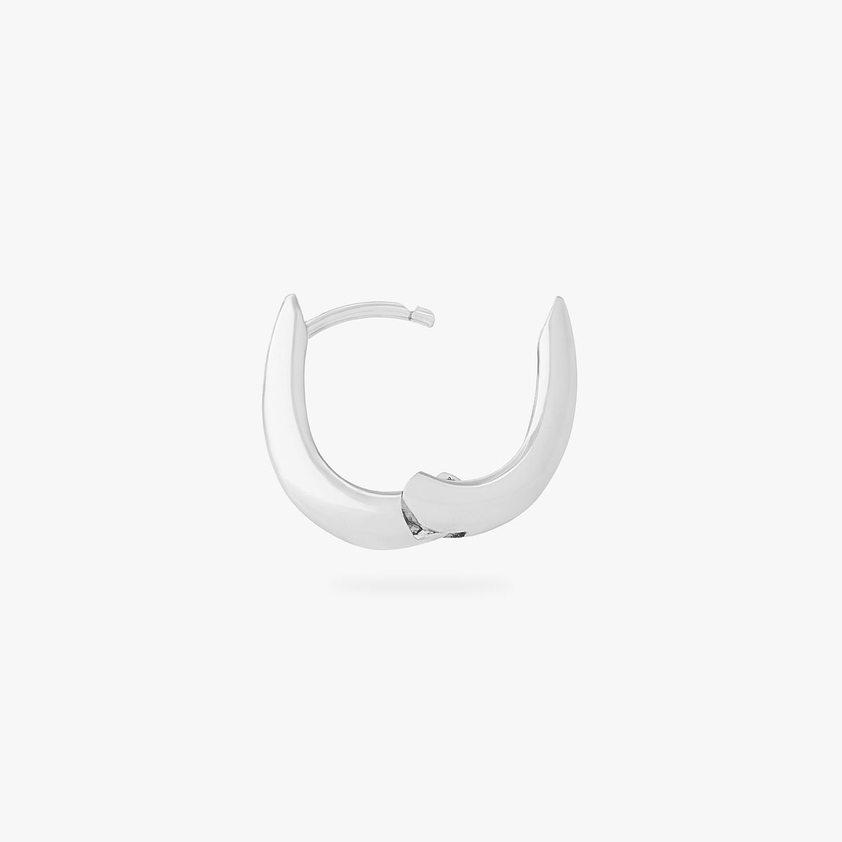 This is an image of a silver-toned, small, crescent shaped huggie. color:null|silver