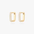 This is an image of a pair of gold-toned, square-shaped huggies with pave CZ stones. [pair] color:null|gold/clear